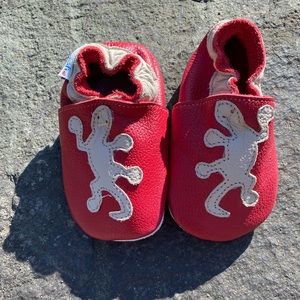 Pumili Emma the lizard soft soled pre-walking shoes. Made in Costa Rica.